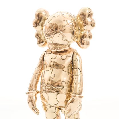 Kaws Rompecabezas Dorado